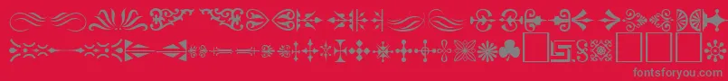 Ornament ffy-fontti – harmaat kirjasimet punaisella taustalla
