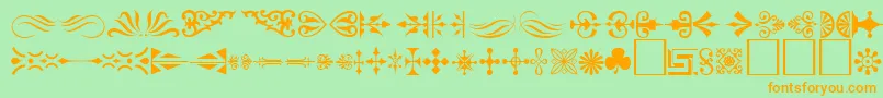 Ornament ffy-fontti – oranssit fontit vihreällä taustalla
