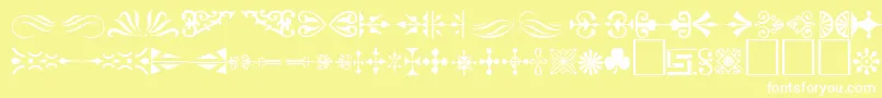 Ornament ffy-fontti – valkoiset fontit keltaisella taustalla