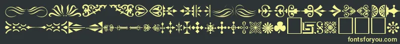 Ornament ffy-fontti – keltaiset fontit mustalla taustalla