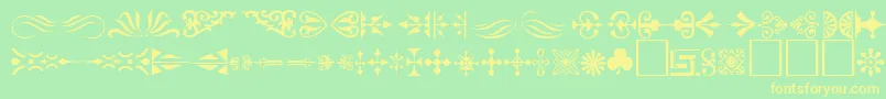 Ornament ffy-fontti – keltaiset fontit vihreällä taustalla