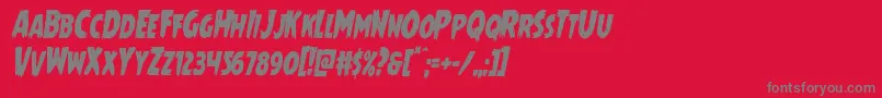 フォントMrsmonstercondital – 赤い背景に灰色の文字