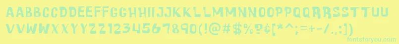 フォントCartoonicMassiveRegular – 黄色い背景に緑の文字