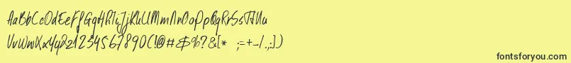 DkKusukusu Font – Black Fonts on Yellow Background