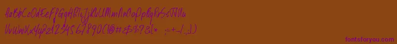 DkKusukusu Font – Purple Fonts on Brown Background