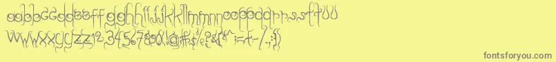 Шрифт Dilate. – серые шрифты на жёлтом фоне