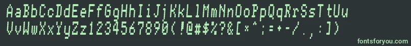 フォントConmanfat – 黒い背景に緑の文字
