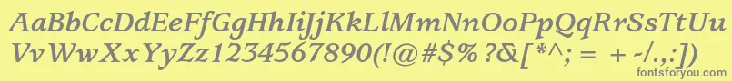 UsherwoodstdBolditalic-Schriftart – Graue Schriften auf gelbem Hintergrund