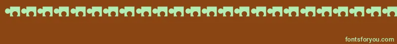 Saiba mais sobre a fonte Puzzle Fonte Puzzle – fontes verdes em um fundo marrom