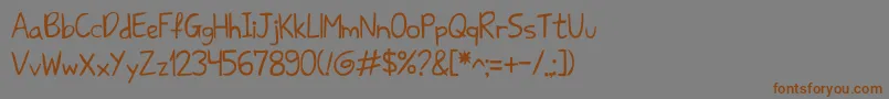 フォントSharkhandwriteabc – 茶色の文字が灰色の背景にあります。