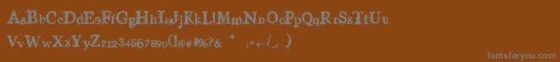 Czcionka VinylGeorge – szare czcionki na brązowym tle
