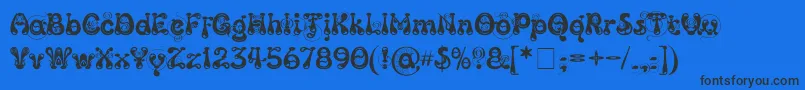 フォントKingthingsSlipperylip – 黒い文字の青い背景