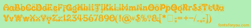 KingthingsSlipperylip Font – Orange Fonts on Green Background