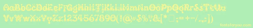 KingthingsSlipperylip Font – Yellow Fonts on Green Background