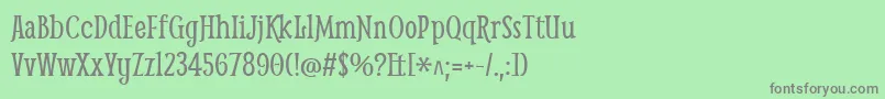 フォントSmytheRegular – 緑の背景に灰色の文字