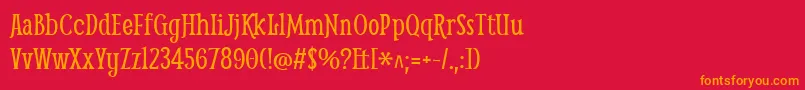 フォントSmytheRegular – 赤い背景にオレンジの文字