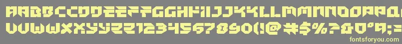 Tokyodrifterstaightexpand-Schriftart – Gelbe Schriften auf grauem Hintergrund