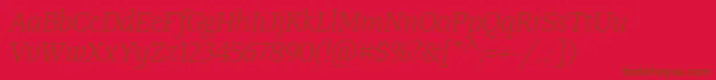 フォントTangerserifmediumulLightitalic – 赤い背景に茶色の文字