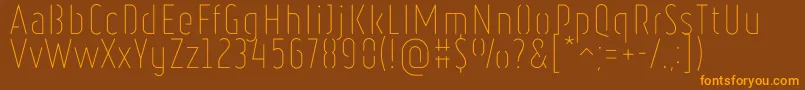 RulerStencilThin Font – Orange Fonts on Brown Background