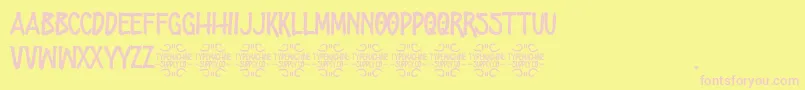 ZombiesStation-fontti – vaaleanpunaiset fontit keltaisella taustalla