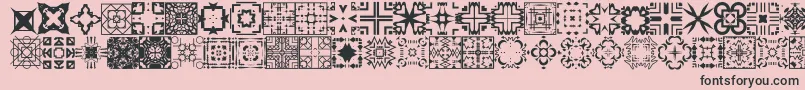 Czcionka FontcoDesigns1 – czarne czcionki na różowym tle