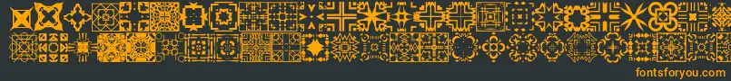 Шрифт FontcoDesigns1 – оранжевые шрифты на чёрном фоне