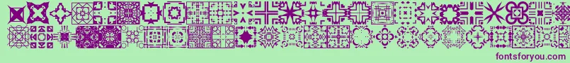 FontcoDesigns1-fontti – violetit fontit vihreällä taustalla