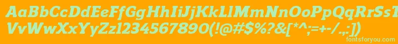 ReganslabHeavyitalic-Schriftart – Grüne Schriften auf orangefarbenem Hintergrund