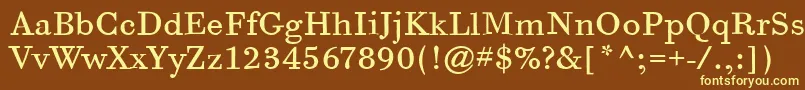 BodoniSixItcBook-fontti – keltaiset fontit ruskealla taustalla