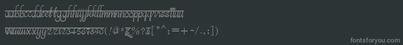 フォントBitsindiancalligraRegular – 黒い背景に灰色の文字
