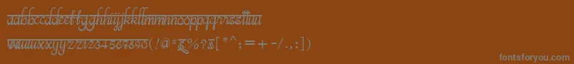 Шрифт BitsindiancalligraRegular – серые шрифты на коричневом фоне