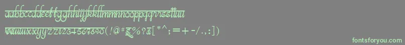 フォントBitsindiancalligraRegular – 灰色の背景に緑のフォント