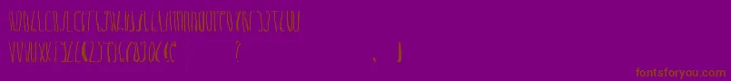 フォントDheLongZim – 紫色の背景に茶色のフォント