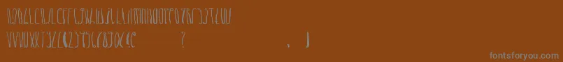 Шрифт DheLongZim – серые шрифты на коричневом фоне