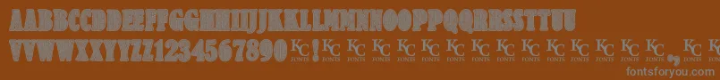 Criminologydemo-Schriftart – Graue Schriften auf braunem Hintergrund