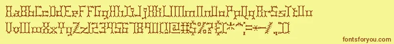 PincersBrk-Schriftart – Braune Schriften auf gelbem Hintergrund