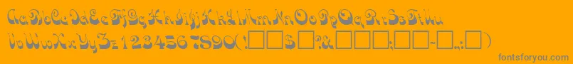 TradewindsskRegular-Schriftart – Graue Schriften auf orangefarbenem Hintergrund