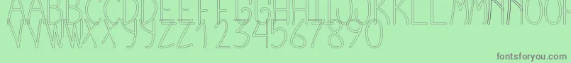 CursiExtraTfbHollow Font – Gray Fonts on Green Background