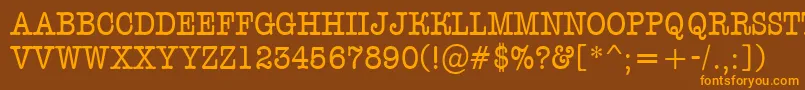 フォントAOldtypertitulnr – オレンジ色の文字が茶色の背景にあります。
