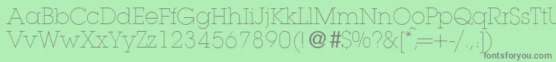 フォントL850SlabLightRegular – 緑の背景に灰色の文字