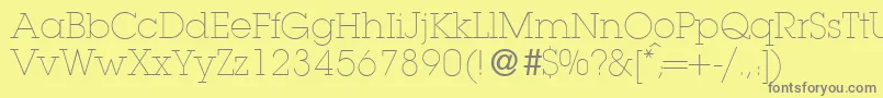 L850SlabLightRegular Font – Gray Fonts on Yellow Background