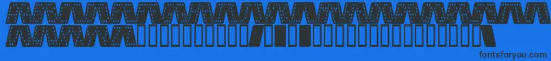 DominoSmalKursiv-fontti – mustat fontit sinisellä taustalla