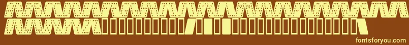 DominoSmalKursiv-fontti – keltaiset fontit ruskealla taustalla