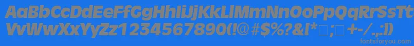 MisceDisplaySsiItalic-fontti – harmaat kirjasimet sinisellä taustalla