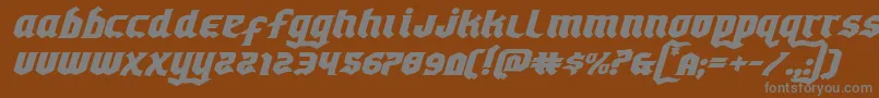 Empirecrownexpandital-Schriftart – Graue Schriften auf braunem Hintergrund