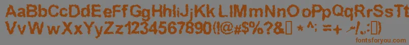 Inkedw Font – Brown Fonts on Gray Background