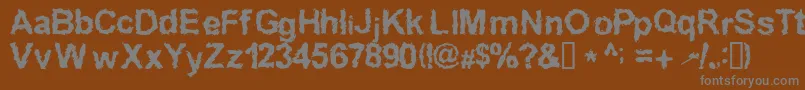 Inkedwフォントについての詳細 フォントInkedw – 茶色の背景に灰色の文字