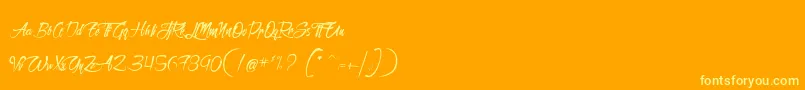 SanctuaireDuMachiniste Font – Yellow Fonts on Orange Background