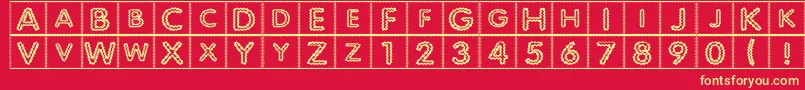 フォントQuiltedIndian – 黄色の文字、赤い背景