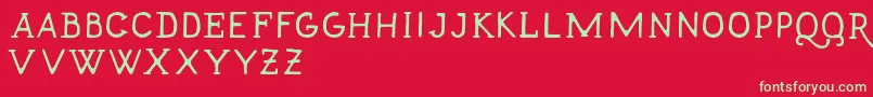 フォントTalismanfree – 赤い背景に緑の文字